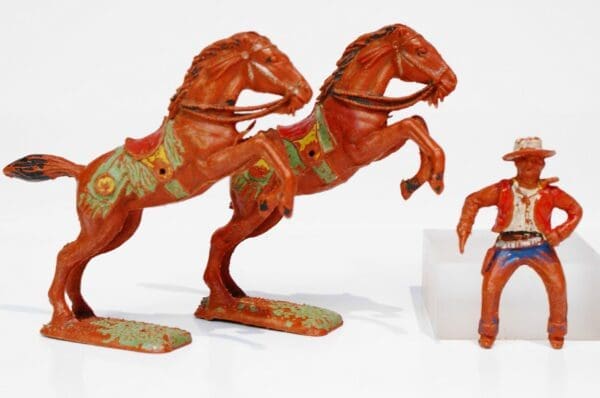 SOLD UNA Mounted Cowboy with Pair of Leaping Horses