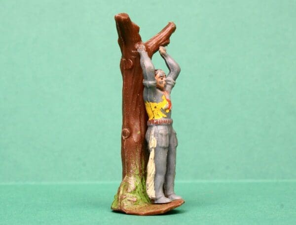 SOLD Timpo RARE Solid Plastic Prisoner Tied to Tree