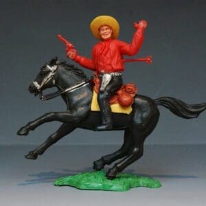 SOLD Timpo Swoppet 1st Series Mounted Wounded Cowboy