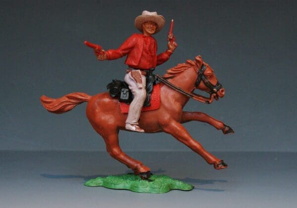 SOLD Timpo 1st Series Mounted Twin Guns Cowboy