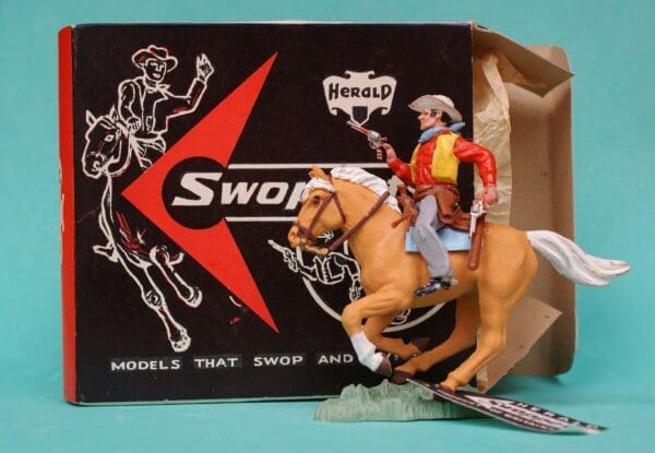 SOLD Herald Swoppet Cowboy Firing Twin Guns Mounted VNMB!