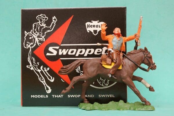 SOLD Herald Swoppet Wounded Cowboy Mounted (1st Issue 1958)