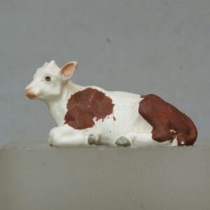 SOLD Britains SMOOTH Plastic Ayrshire Calf Lying - Almost Mint!