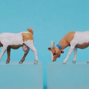 SOLD Herald Goat Feeding (Tan & White) - BLUE Collar Variant