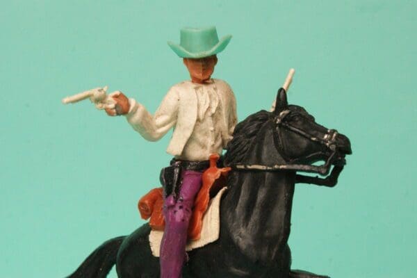 SOLD Timpo 1st Series Mounted Twin Guns Cowboy - Big Hat