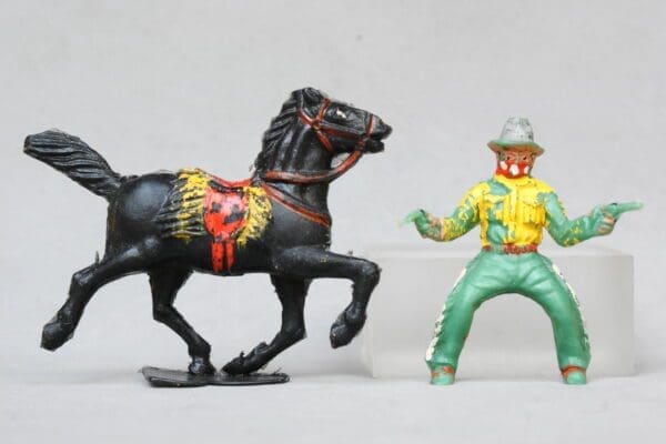 SOLD Timpo Mounted Cowboy Twin Pistols (Lead Mould)
