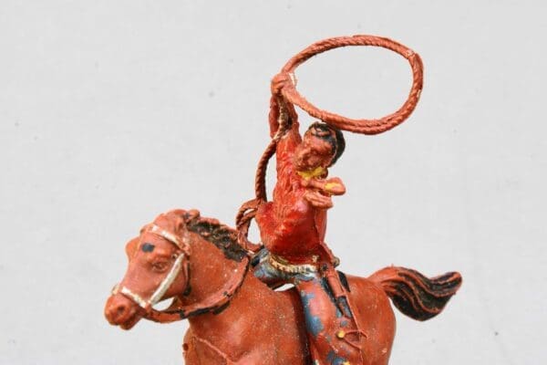 SOLD UNA Mounted Cowboy Lassoing (Herald copy)