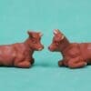 SOLD Pair Herald Lying Calves - BROWN Plastic!