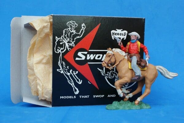 SOLD Herald Swoppet Mounted Cowboy with Twin Guns