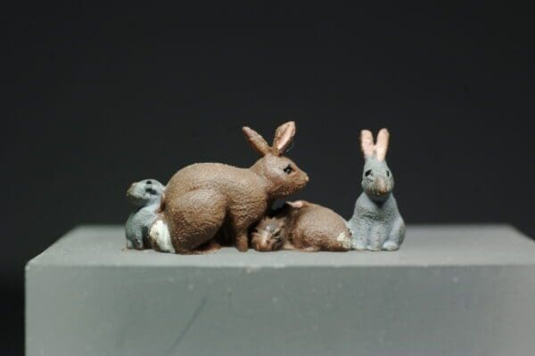 Herald Doe Rabbit with Young (Dark Brown)