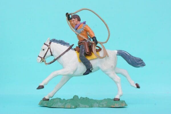 SOLD Herald Swoppet Mounted Cowboy with Lasso