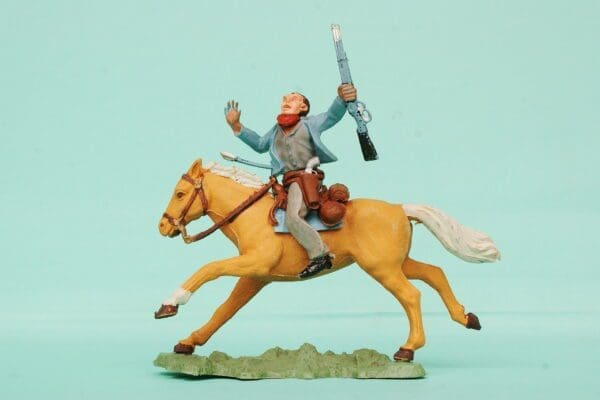 SOLD Herald Swoppet Mounted Cowboy Wounded by Arrow