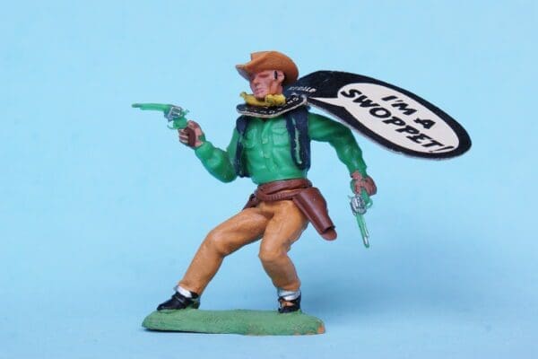 SOLD Herald "I'm A Swoppet!" Cowboy Twin Guns (Green Torso)