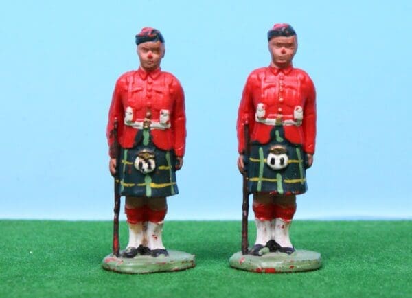 SOLD Pair of Herald Scotsmen, at Attention