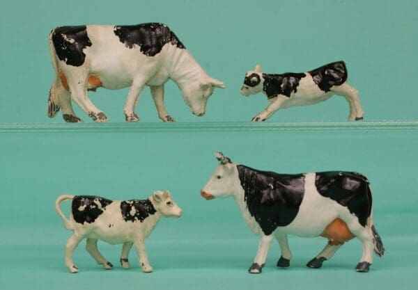 SOLD Timpo Cows & Calves - Early Gloss Black Markings
