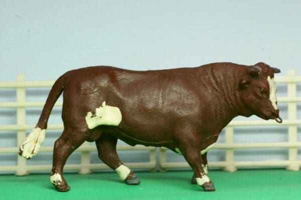 SOLD Herald Brown Bull with Ring in Nose