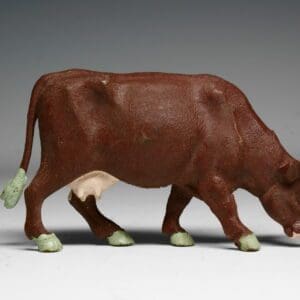 SOLD Britains Cow Feeding Brown PVC