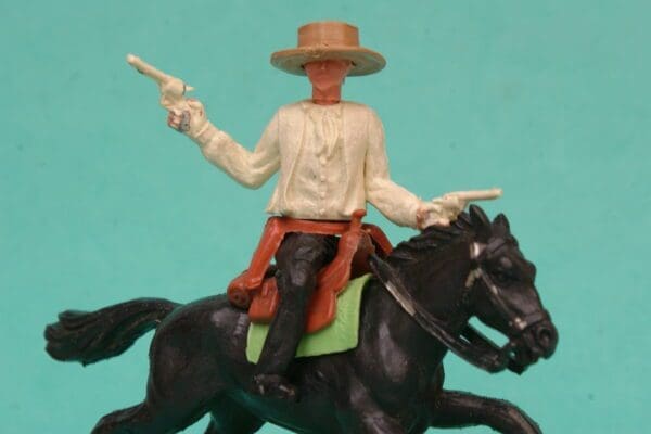 SOLD Timpo 1st Series Mounted Twin Guns Cowboy - Big Hat