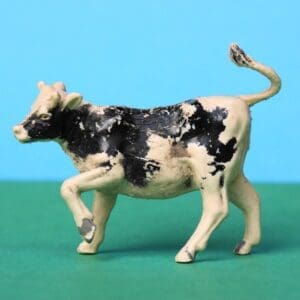 SOLD Herald Black Stencil-sprayed Heifer Calf Walking