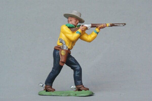 SOLD Herald Swoppet Cowboy Standing Firing Rifle