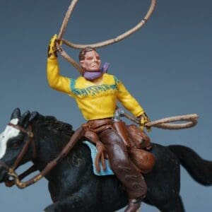 SOLD Swoppet Mounted Cowboy with Lasso (Yellow Torso)