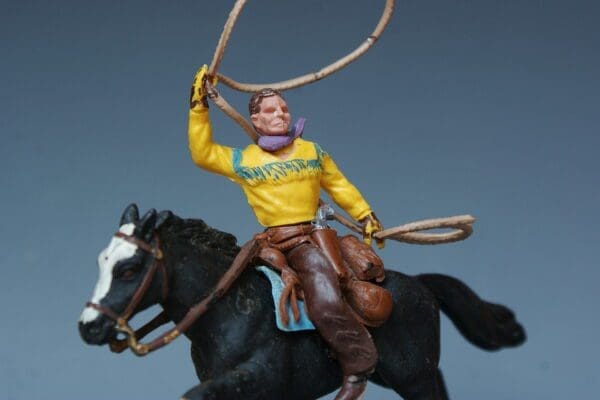 SOLD Swoppet Mounted Cowboy with Lasso (Yellow Torso)
