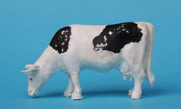 SOLD Taylor & Sons Cow Grazing - Black Friesian Markings