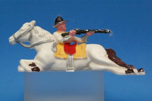 SOLD Hilco Plastic Cowboy Firing from behind Lying Horse