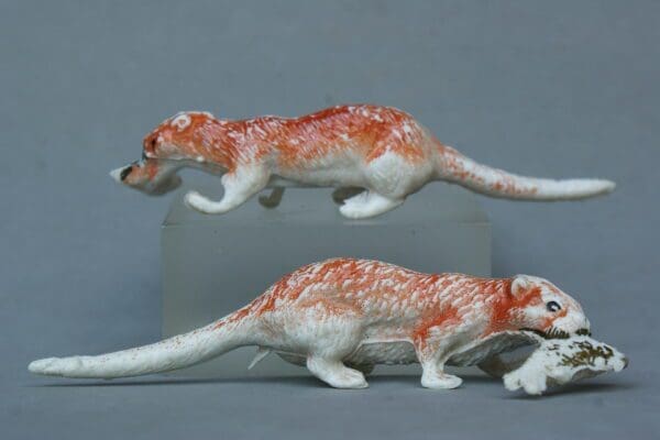 SOLD Hilco Pair of Zoo Otters (Fish in Mouth)