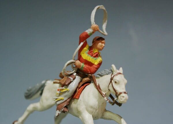 SOLD Herald Mounted Cowboy Lassoing - RED Shirt