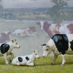 SOLD Herald Cow Feeding & 2 Calves (Friesians)