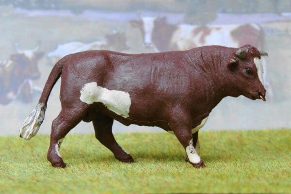 SOLD Herald Brown Bull with Ring in Nose