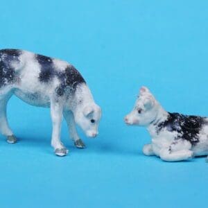 SOLD Black Stencil-sprayed Calves Feeding & Lying