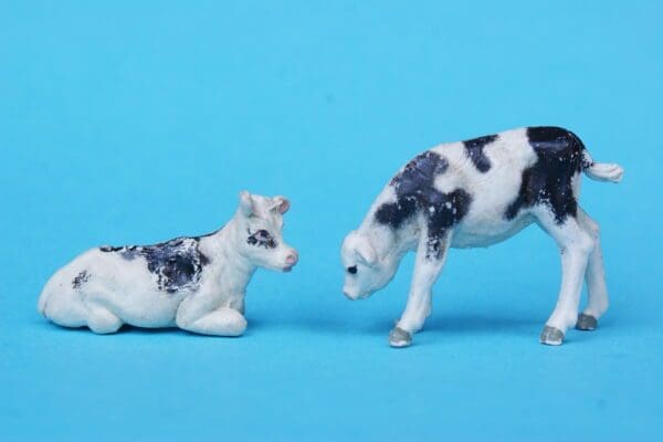 SOLD Black Stencil-sprayed Calves Feeding & Lying - Image 3