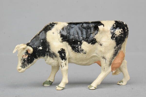 SOLD Herald BLACK Stencil-sprayed Cow (Feeding)