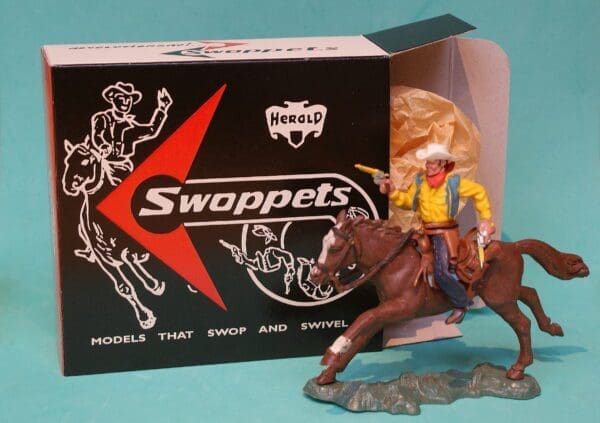 SOLD Herald Swoppet Cowboy Firing Twin Guns Mounted