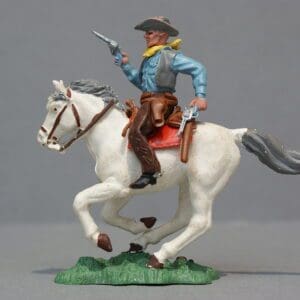 Herald Swoppet Mounted Cowboy Firing Twin Guns - 1st Issue