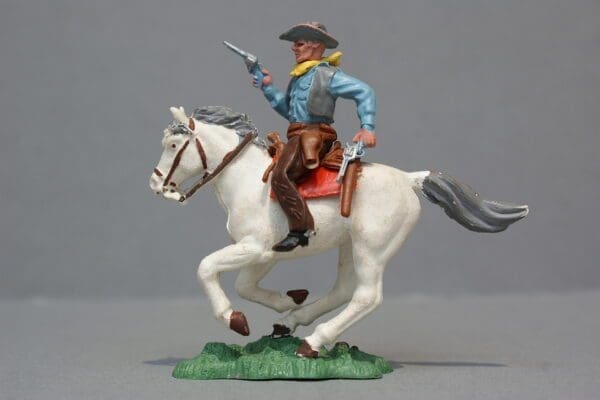 Herald Swoppet Mounted Cowboy Firing Twin Guns - 1st Issue
