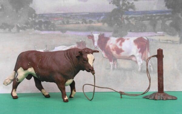 SOLD Herald Brown Bull (tied to Post)