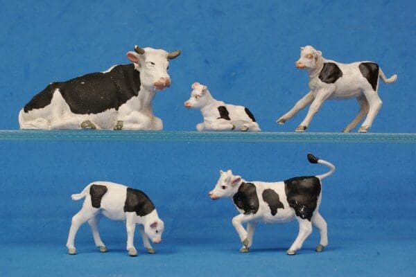 SOLD Set of Herald Friesian Calves + Britains Lying Cow