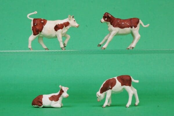 SOLD Set of Herald Ayrshire Calves - Marked 'ENGLAND'