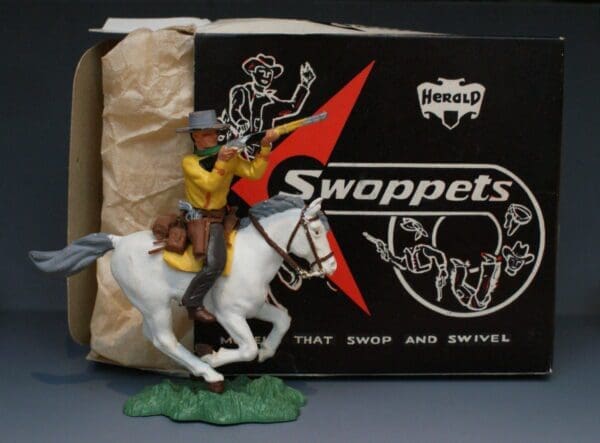 SOLD Herald Swoppet Cowboy Firing Rifle Mounted (Yellow)