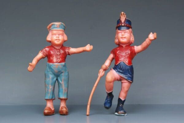 SOLD Poplar Plastic Drum Majorette & Dutch Girl