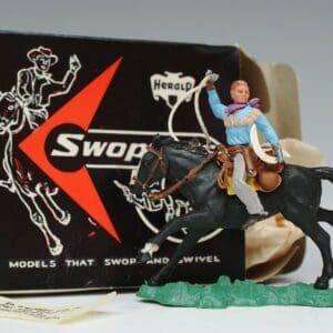 SOLD Herald Swoppet Cowboy Throwing Lasso Mounted