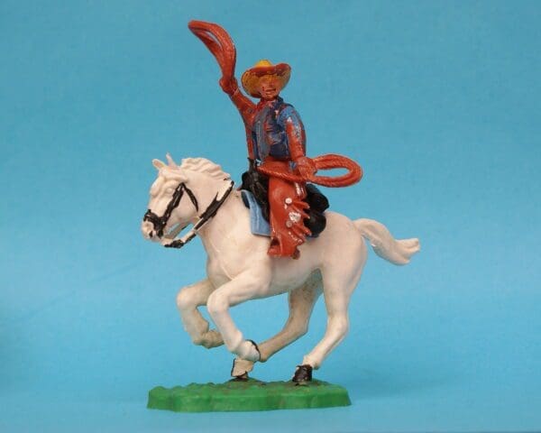 SOLD Timpo Solid Plastic Mounted Cowboy Lassoing