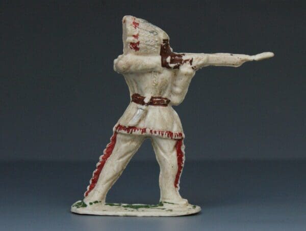 SOLD Trojan Indian in Buckskins firing Rifle