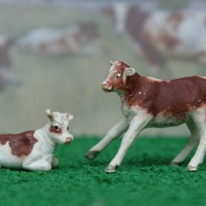 SOLD Herald Spray-Painted Ayrshire Calves - TEXTURED Plastic #1