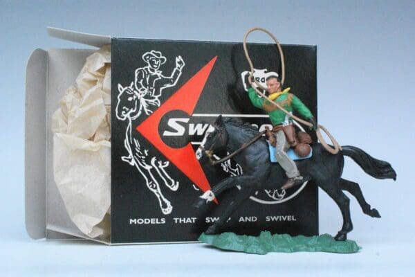 SOLD Herald Swoppet Mounted Cowboy with Lasso