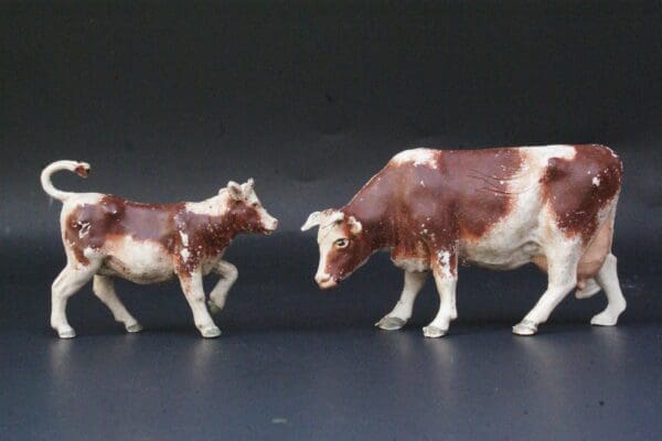 SOLD Herald Ayrshire Cow & Calf - Spray-painted!