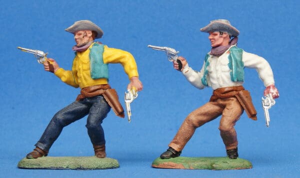 Herald Swoppet Pair of Cowboys Firing Twin Guns